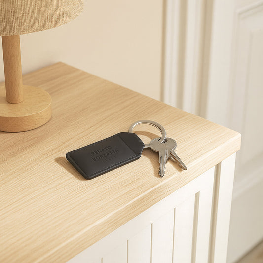 RB0063A | Keychain Made in Italy in Genuine Soft Full-Grain Smooth Leather. Black. Polished Nickel Ring. Total Dimensions: 3.5 x 9.5 x 0.5 cm